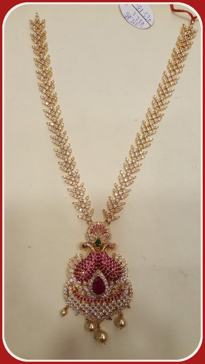 PEACOCK AND WHITE PEARL WITH WHITE STONES DESIGNARY HARAM