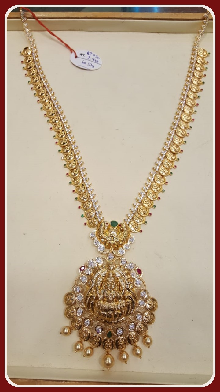 LAKSHMI DEVI LOCKET WITH WHITE STONES